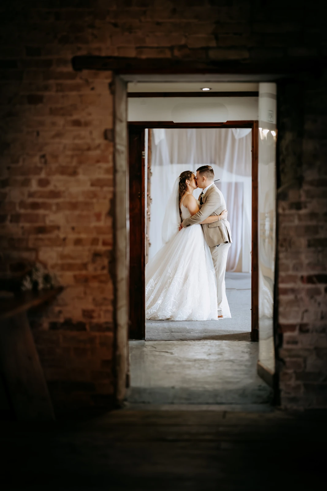 couple in rustic barn st ives wedding photography
