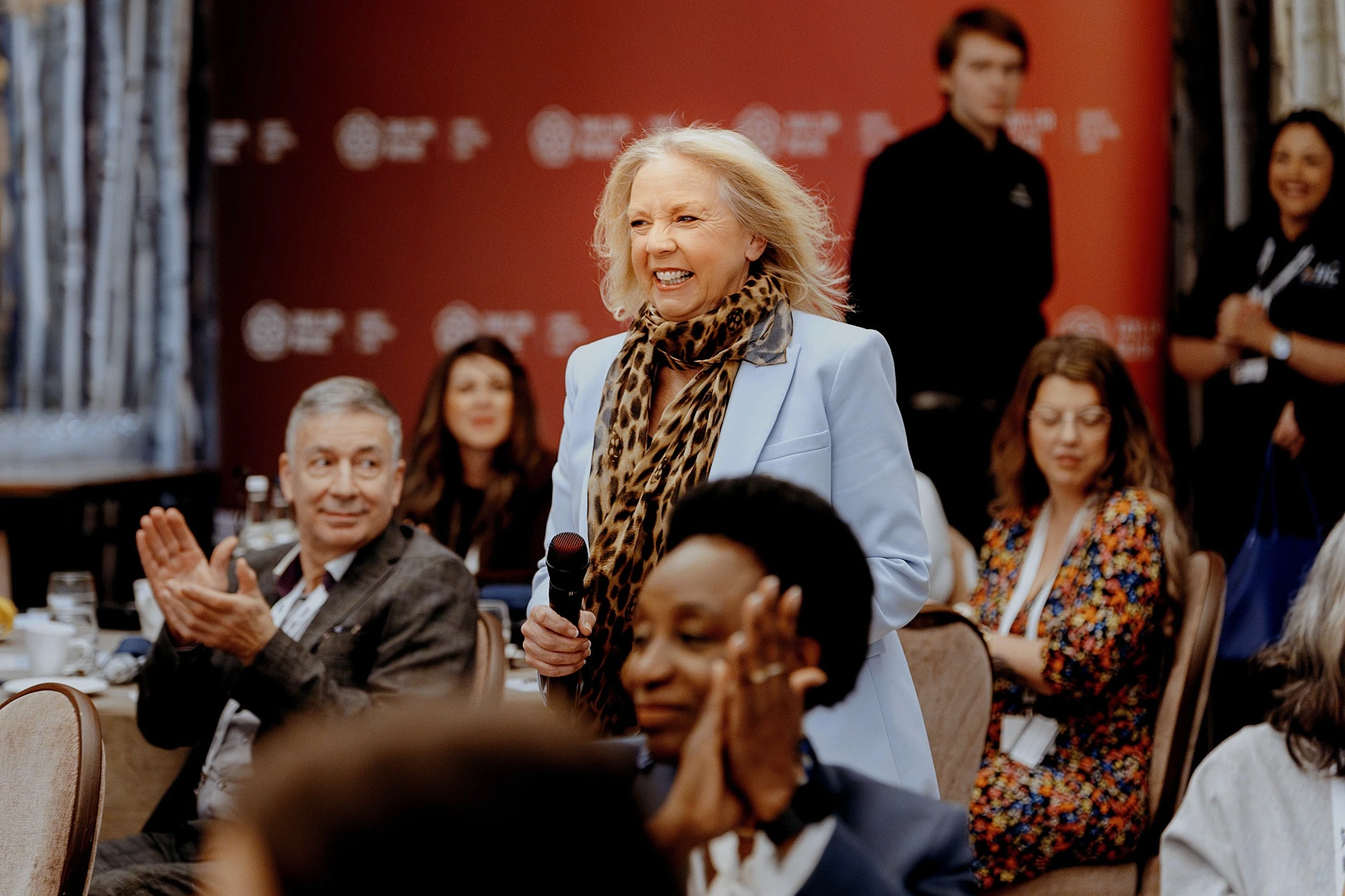 Commercial event photographer capturing a large corporate conference in Cambridgeshire